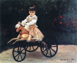 Jean Monet sobre un caballo mecánico