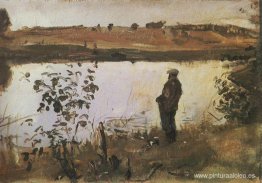 Artista K. Korovin en la orilla del río.