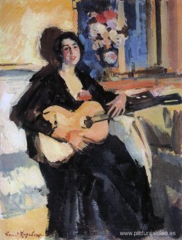 dama con una guitarra