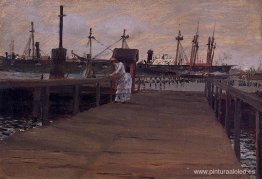 mujer en un muelle