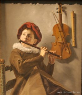 niño tocando la flauta