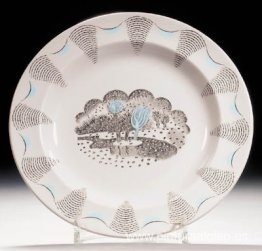 Un plato de su servicio 'Travel' diseñado para Wedgwood