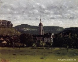 Vista de Ornans y el campanario de su iglesia