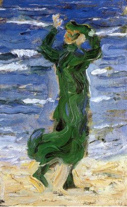 mujer en el viento junto al mar