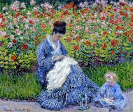 Camille Monet y un niño en el jardín del artista de Argenteuil