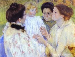 Mujeres admirando a un niño