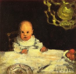 niño en la mesa