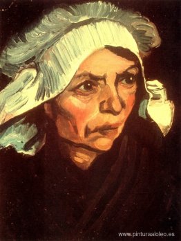 Cabeza de mujer campesina con gorro blanco