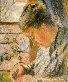 Retrato de Madame Pissarro cosiendo cerca de una ventana