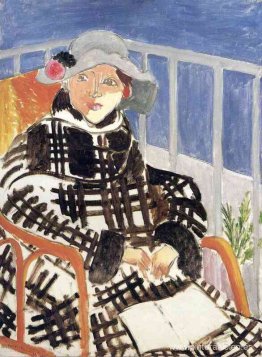 Mlle Matisse con un abrigo a cuadros escoceses