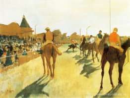 Caballos de carreras ante las gradas